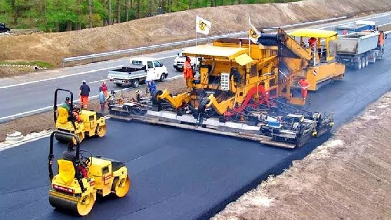 Aerial view of asphalt paving crew